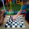 aqui está as crianças que supervisionei durante um evento de xadrez