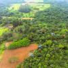 Mapeamento aéreo de propriedade rural para medição precisa de áreas cultivadas e delimitação de divisas conforme normas do INCRA.