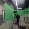 Pintura e instalações de tv's em loja Localiza, seguindo projeto arquiotetônico