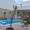 Reforma: Instalação de piscina e criação de área gourmet.