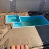 Reforma: Instalação de piscina e criação de área gourmet.