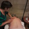 Massagem dorsal contratura