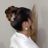 Penteado coque alto para noivas